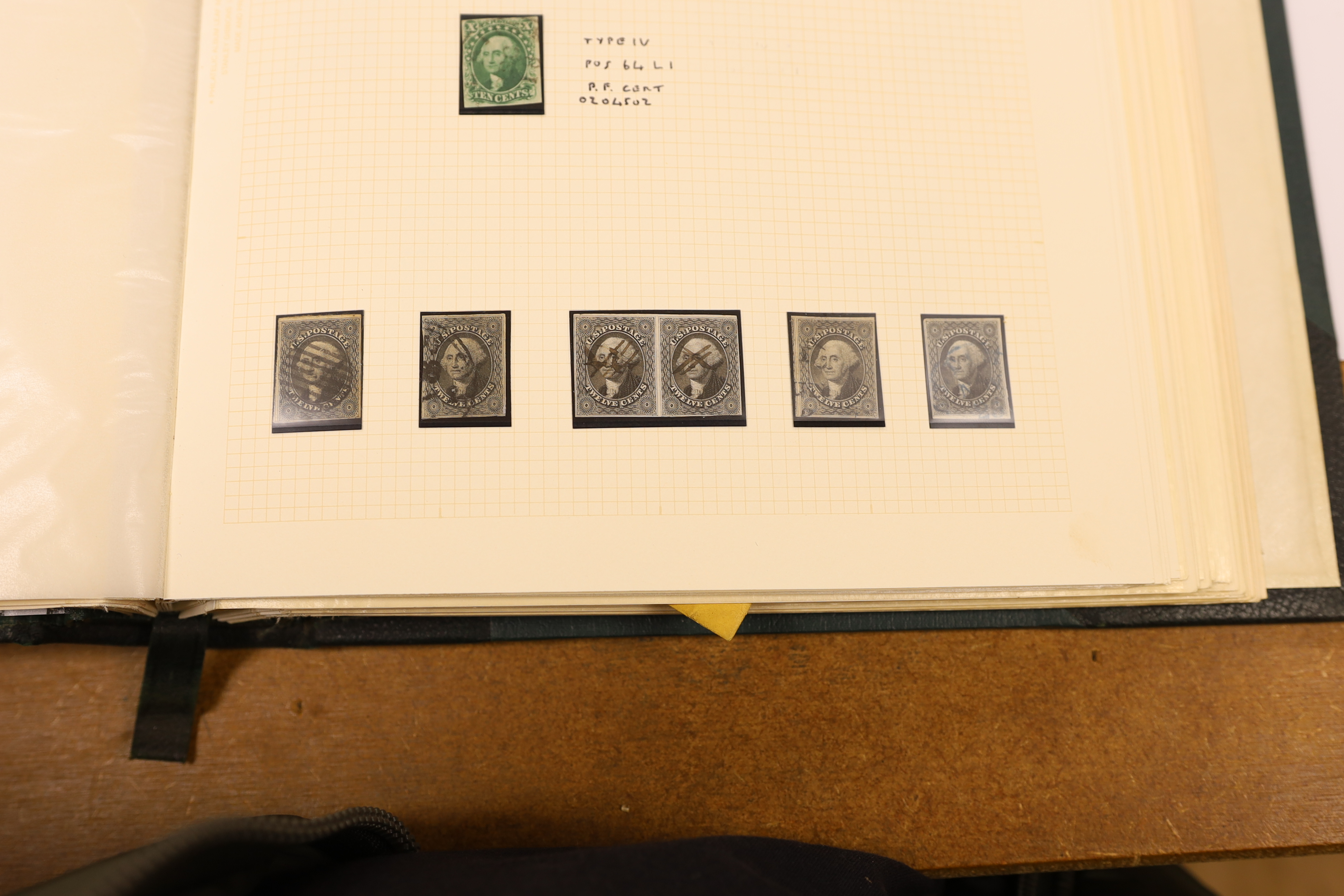 A collection of early United States of America stamps in a Philatelic album including 1845 New York Provisional 5c., 1847-50 5c. (4, one on cover, one single with blue “10” cancel and with RPS Certificate 1956) and 10c.